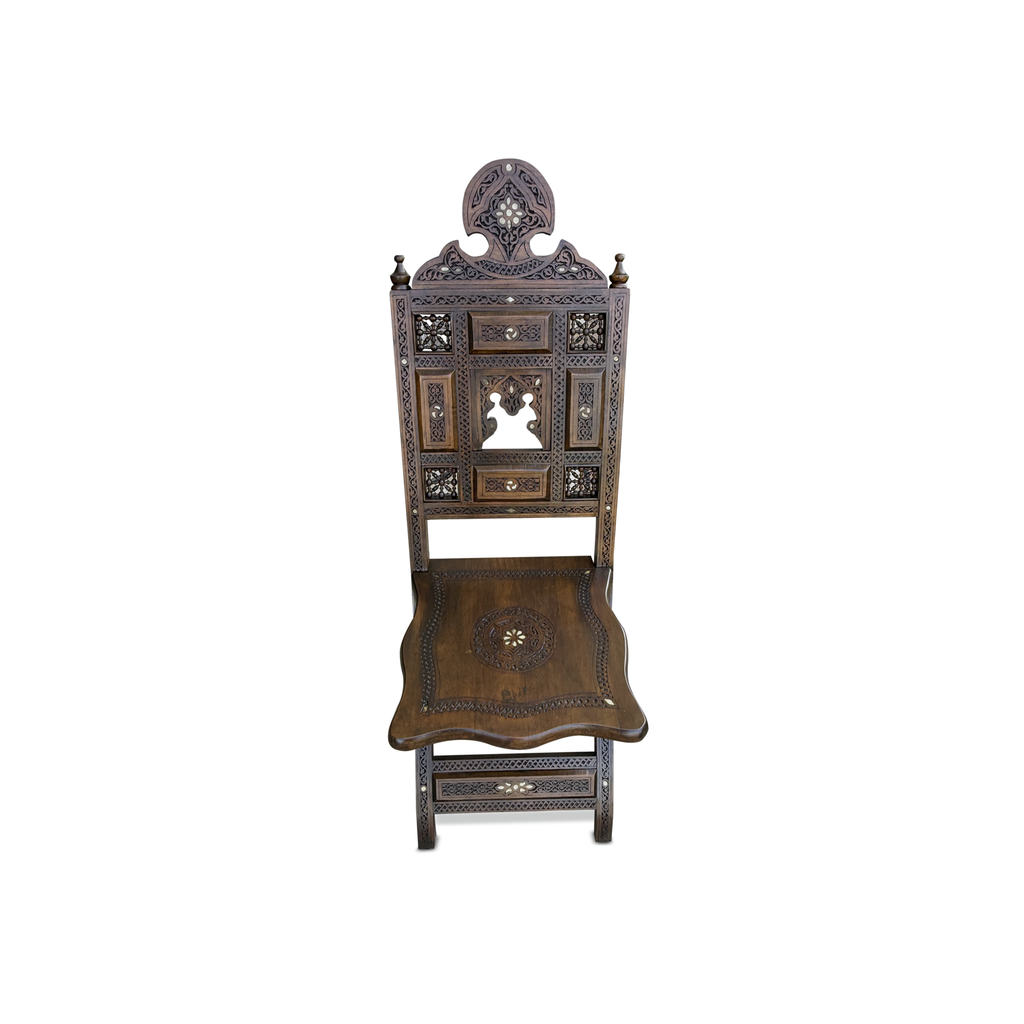 Pair of Syrian walnut folding chairs — front view showing carved back and mother-of-pearl inlay
