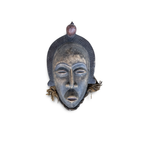Chokwe-style African tribal mask, hand-carved hardwood with dark blue-grey patina, ribbed arched crest, spherical finial, and natural fiber attachments