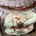 Detail of Satsuma vase showing millefiori ground with moriage gold enamel, butterflies and florals